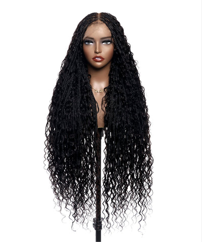A 36-inch long black human hair wig with a boho box braided style displayed on a mannequin head.